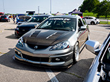 Silver Acura RSX with GRIDLIFE Sticker on Windshield