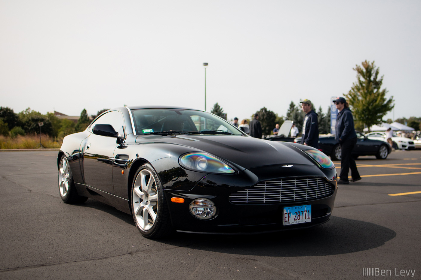 A Black Aston Martin V12 Vanquish arrives at the British Car Festival