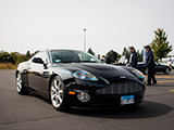 A Black Aston Martin V12 Vanquish arrives at the British Car Festival