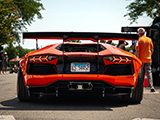 Rear of Orange Wide Body Lamborghini Aventador with Big Wing