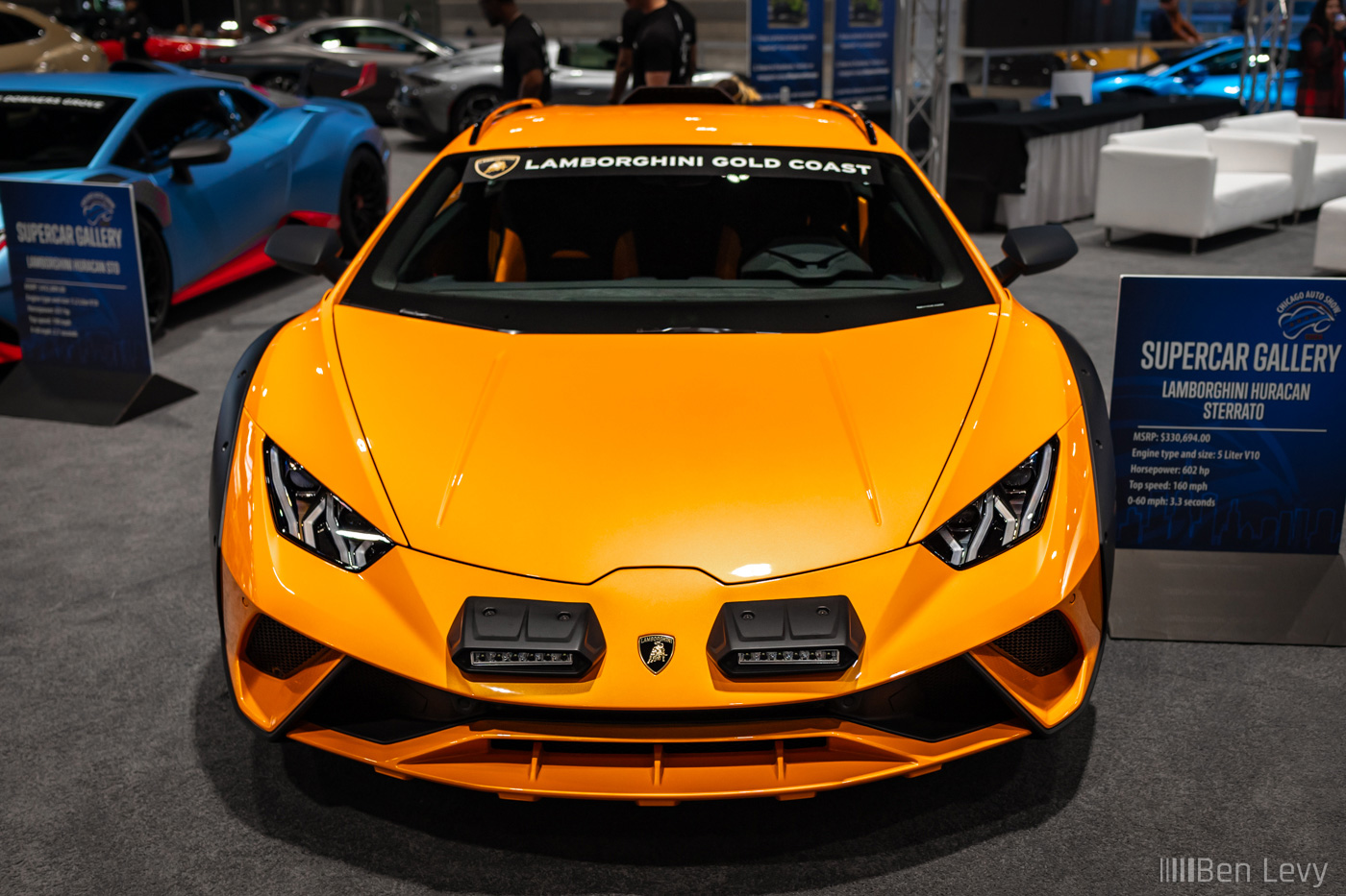 Front of an Orange Lamborghini Huracan Serrato