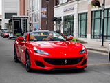 Red Ferrari Portofino leaving Festa Ferrari 2024