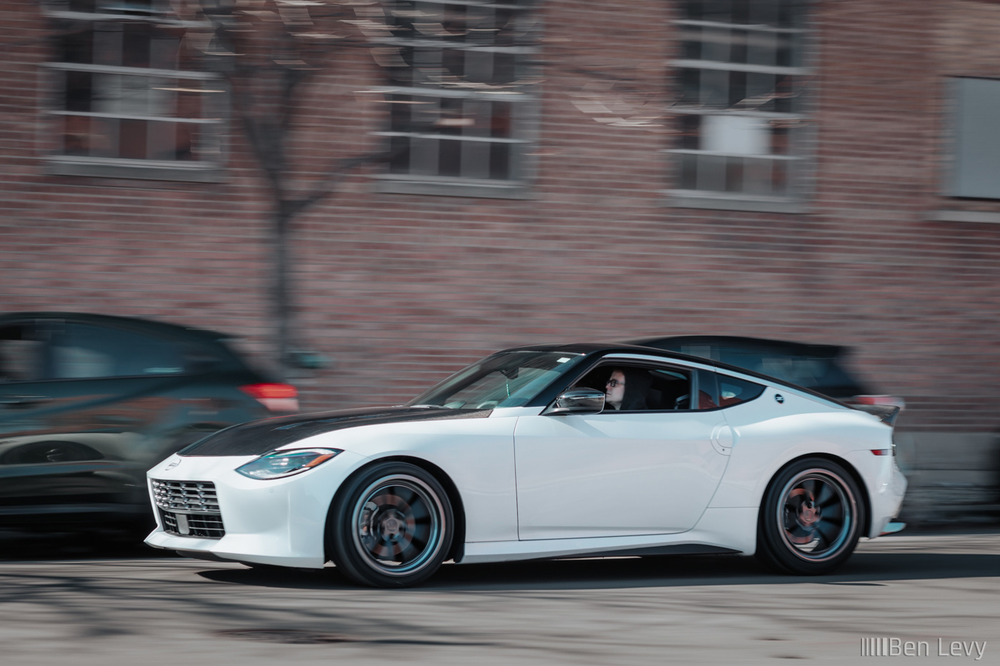 White Nissan Z Passing on a Chicago Street