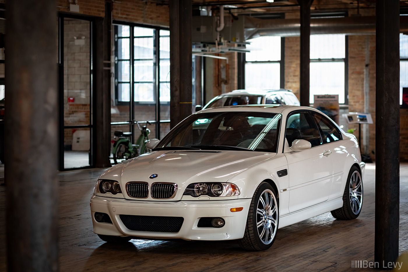 White BMW M3 Parked Indoors