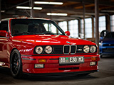 Front of Red BMW M3 in a Warehouse in Chicago