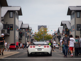White C6 Corvette Driving into Cartoberfest at Iron Gate