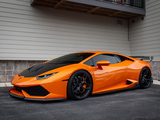 Orange Lamborghini Huracan with Black Wheels and Carbon Fiber Lip