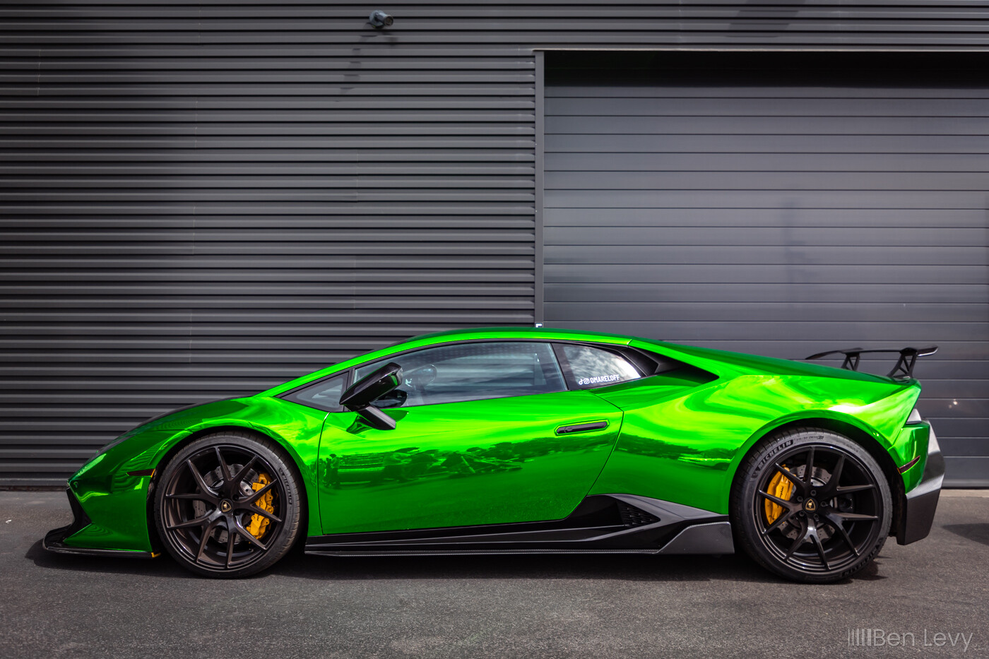 Side of Lamborghini Huracan with Green Wrap