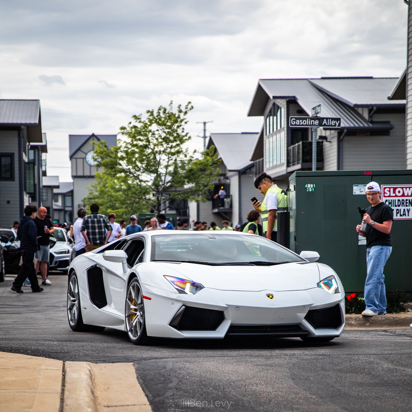 White Lamborghini Aventador leaves Iron Gate in Naperville