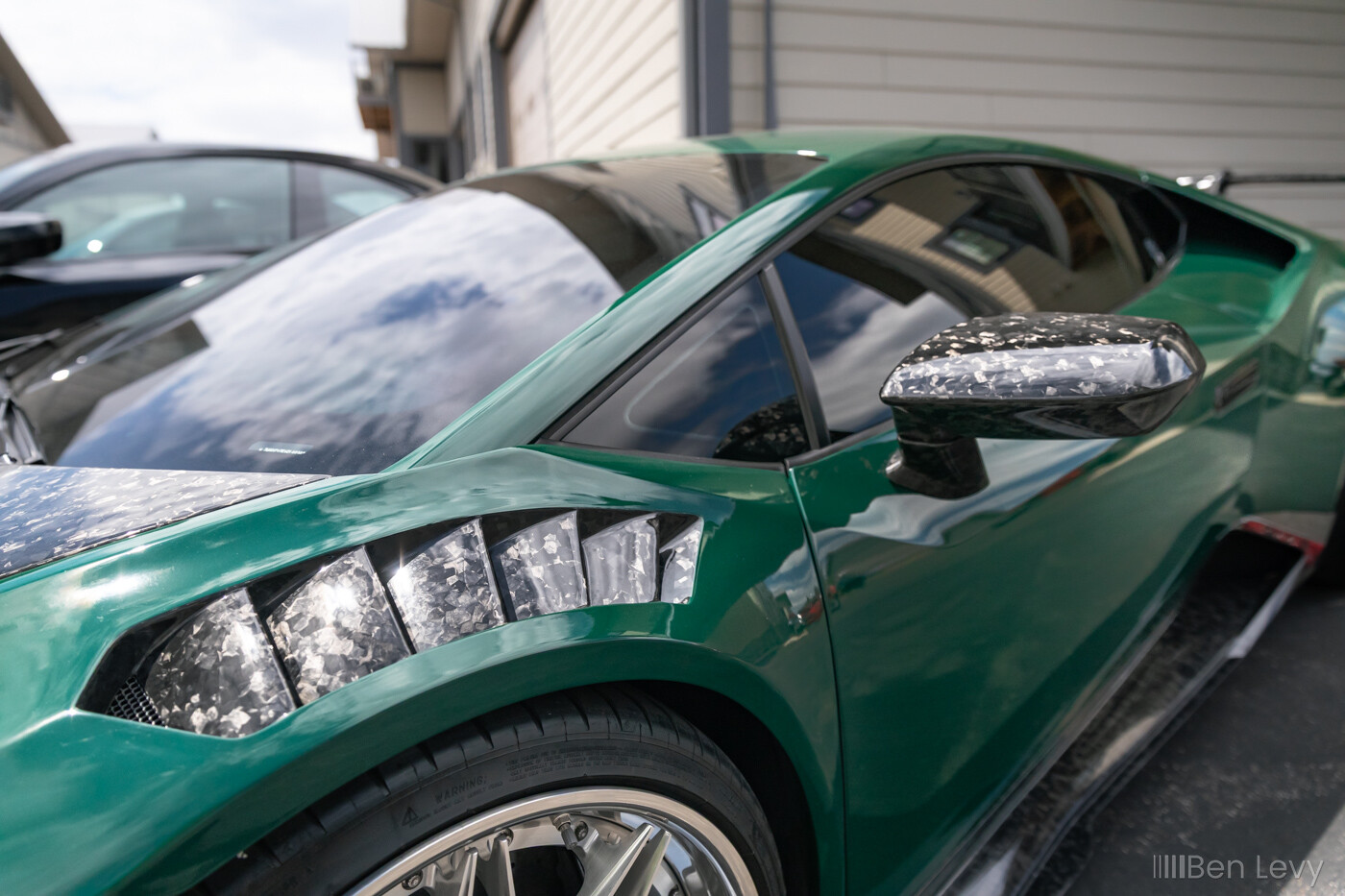 Forged Carbon Fender on Green Lamborghini Huracan