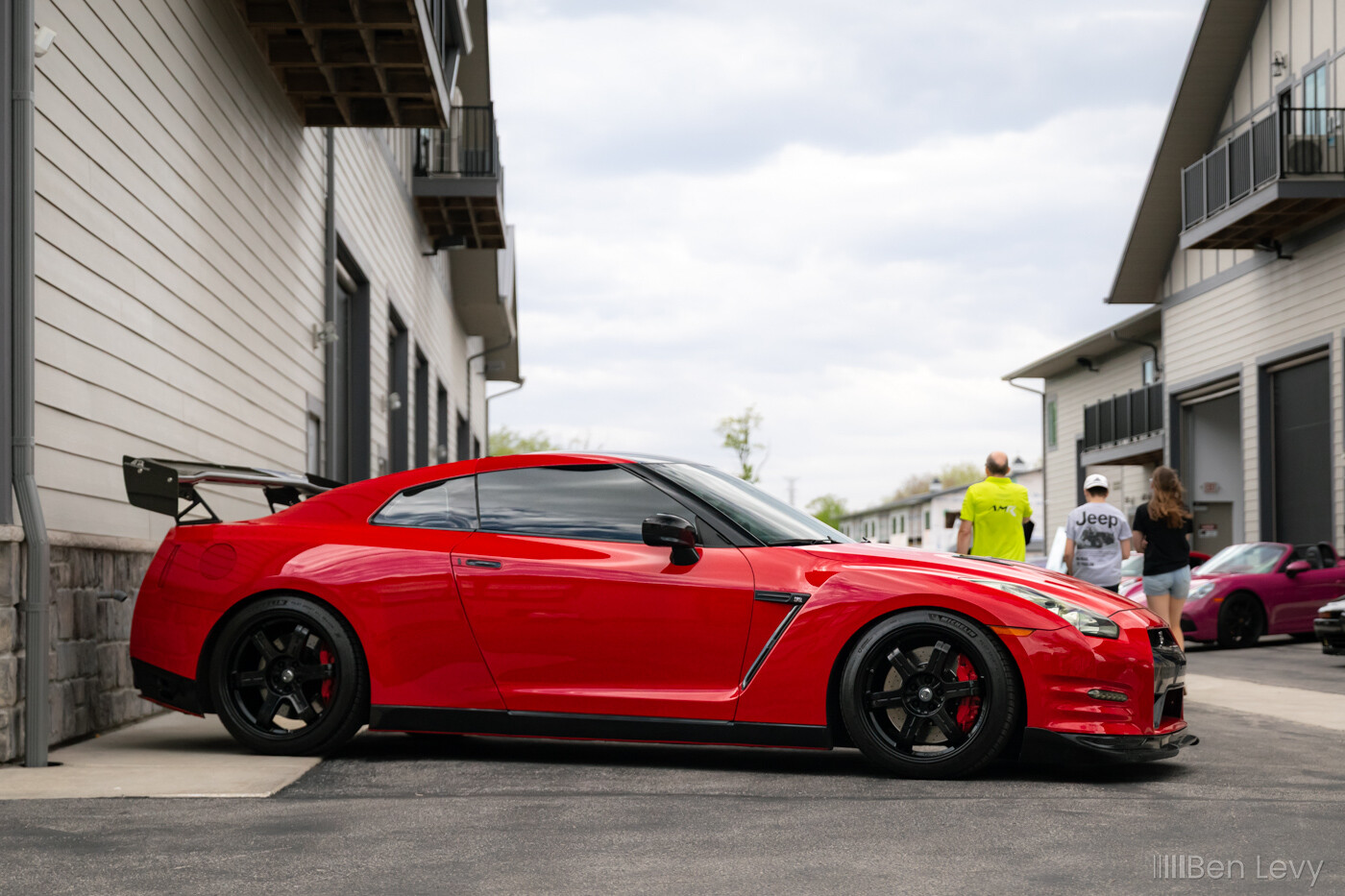 Side of Red R35 Nissan GT-R at Iron Gate