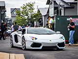 White Lamborghini Aventador leaves Iron Gate in Naperville