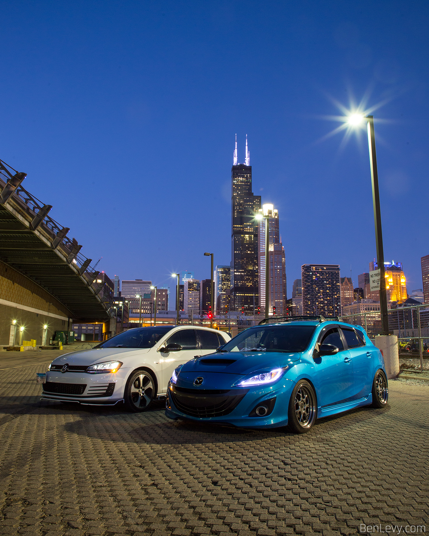 GTI and Mazdaspeed3 against the Chicago Skyline