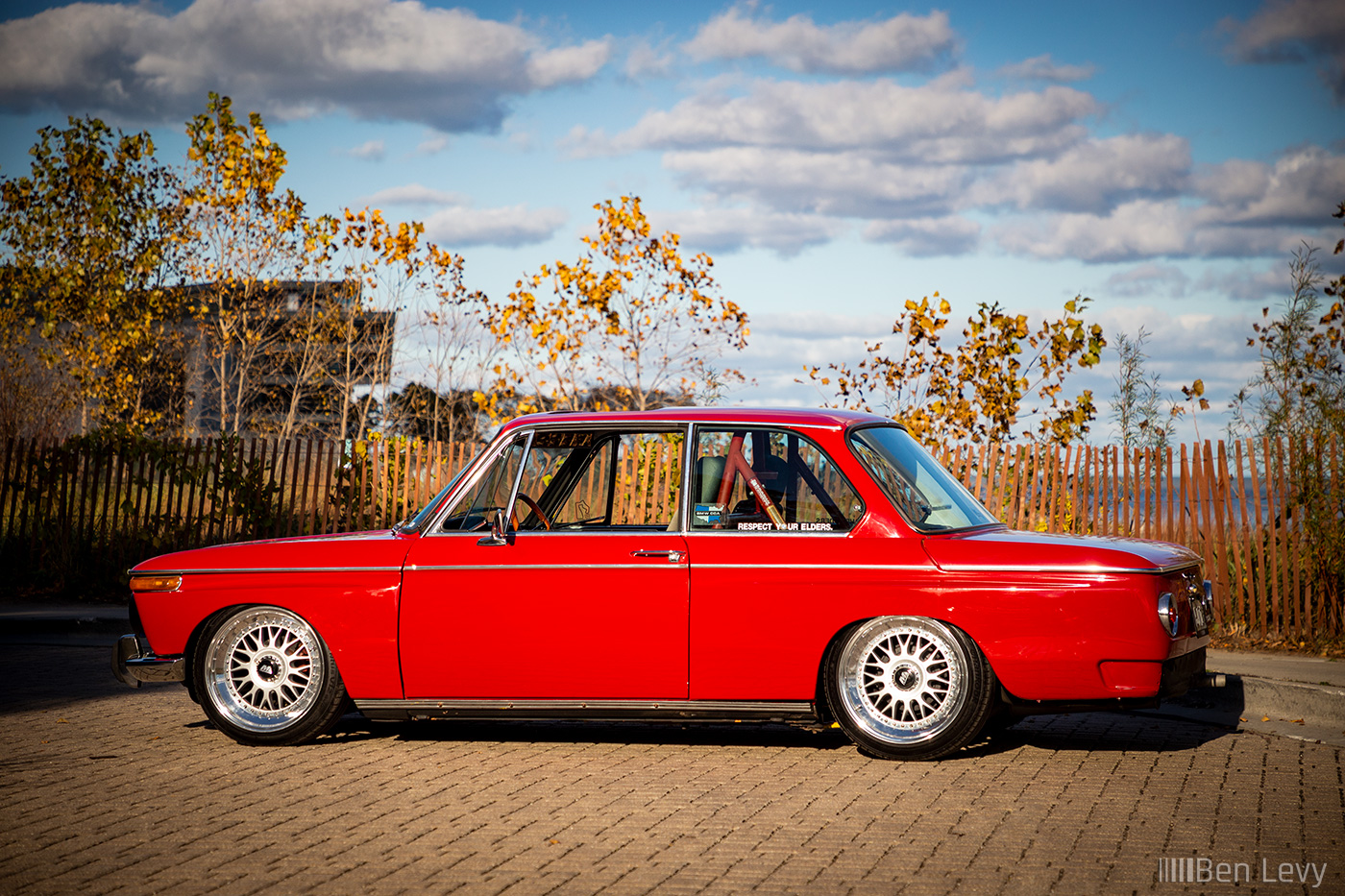 Side of a red BMW 2002