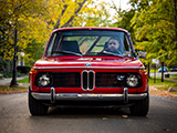 Front of Red BMW 2002 on a Street in Fall