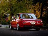 Red BMW 2002 with Rear Bumper Delete