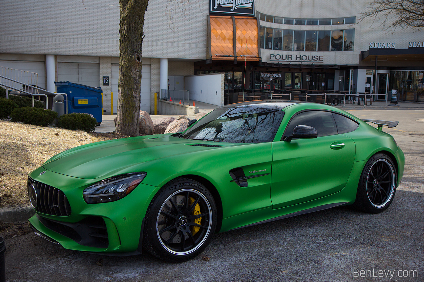Green AMG GTR parked outside of Oakbrook Mall