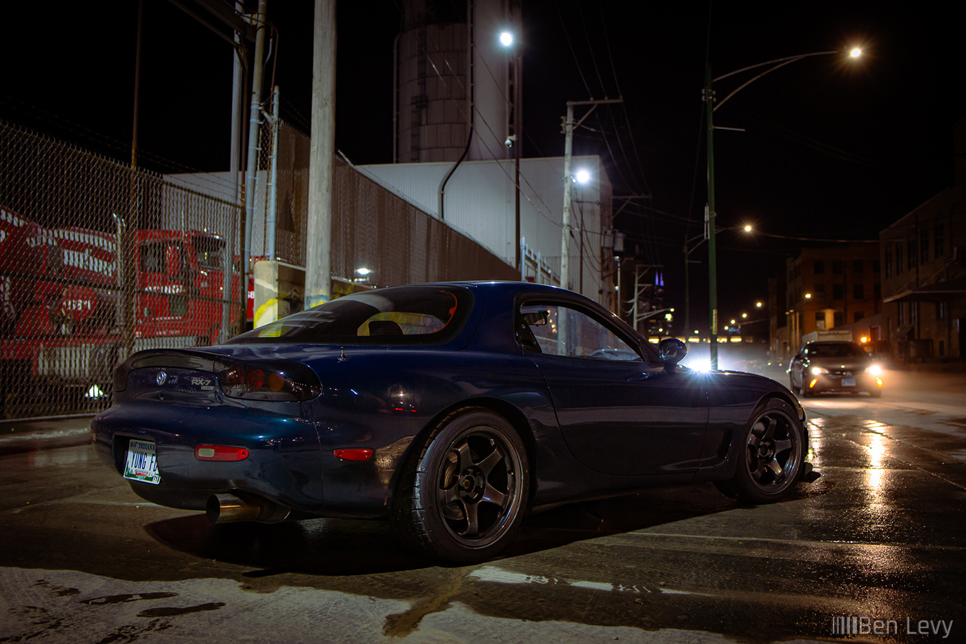 Green Mazda RX-7 in Chicago at Night