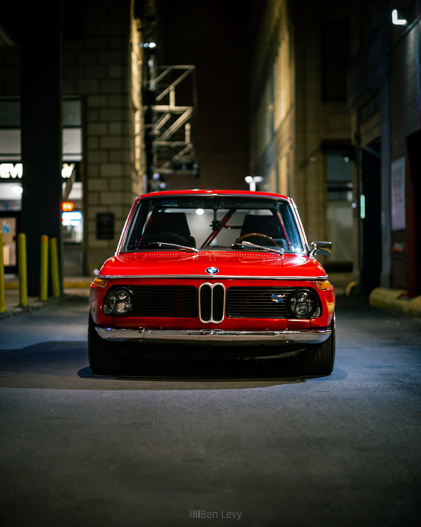 Red BMW 2002 in a Chicago Alley