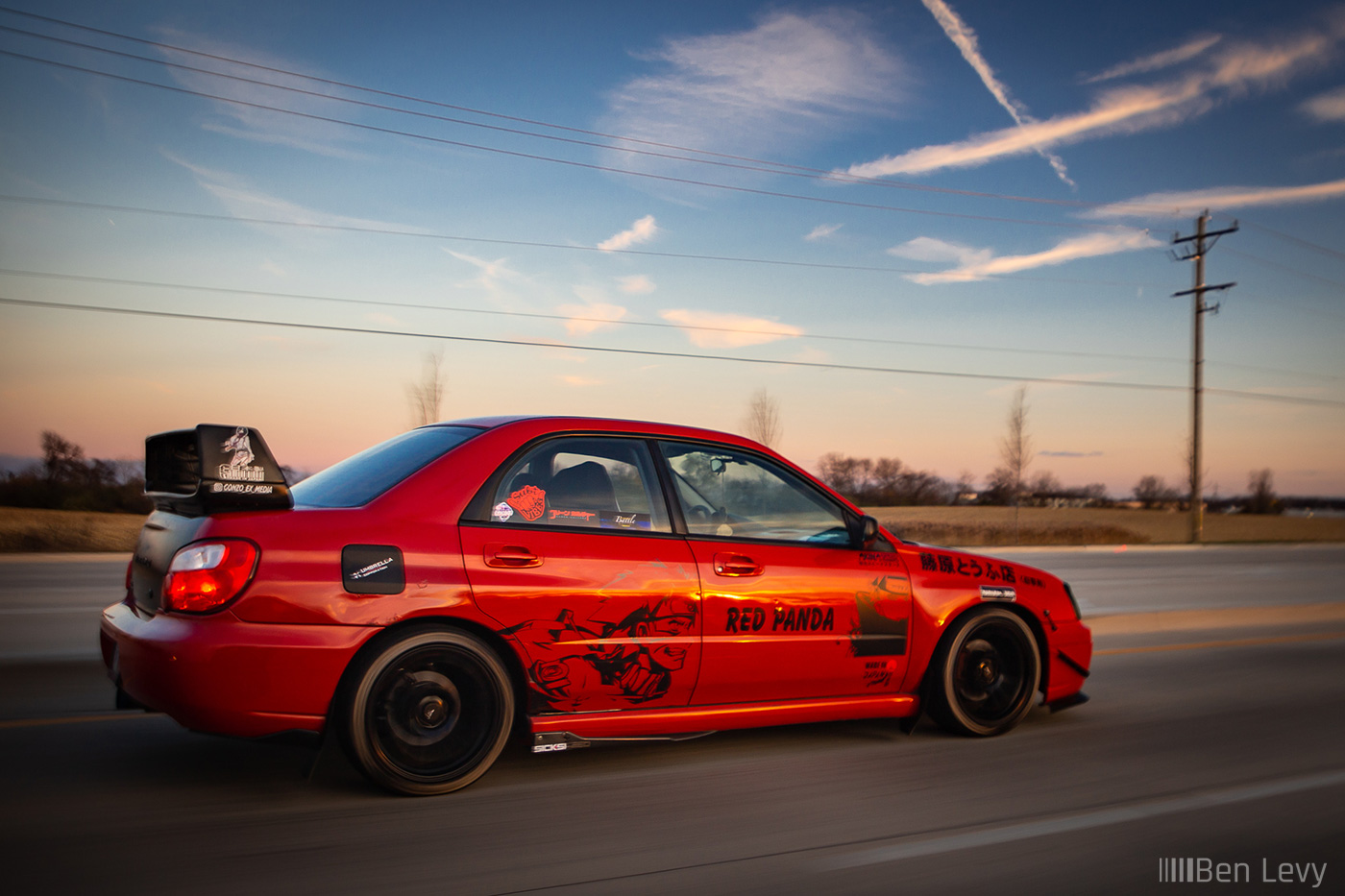Rolling Shot of Red Subaru Impreza in Illinois