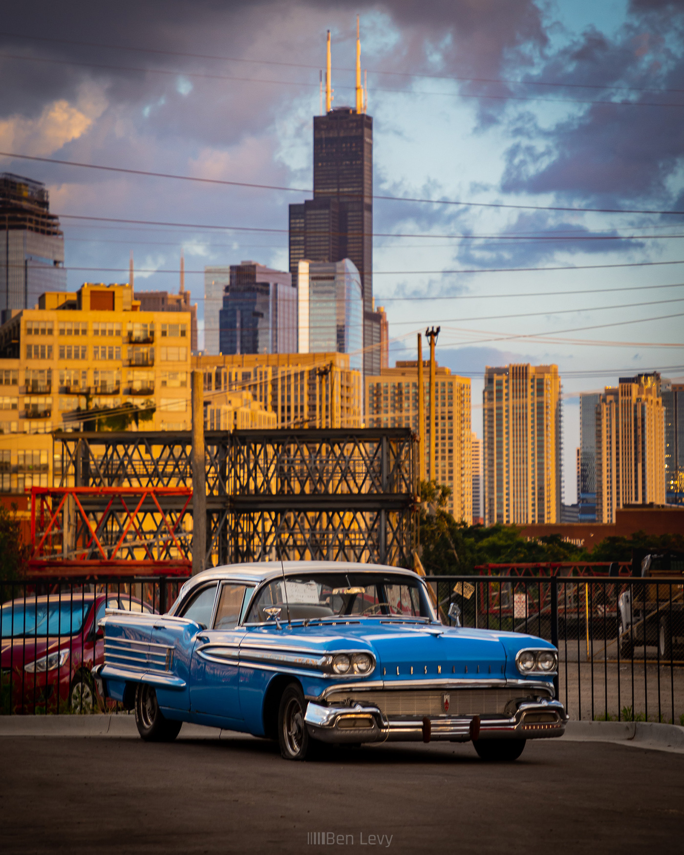 Blue 1958 Oldsmobile Super 88 with the Sears Tower in Back