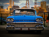 Front of Blue 1958 Oldsmobile Super 88 in the City