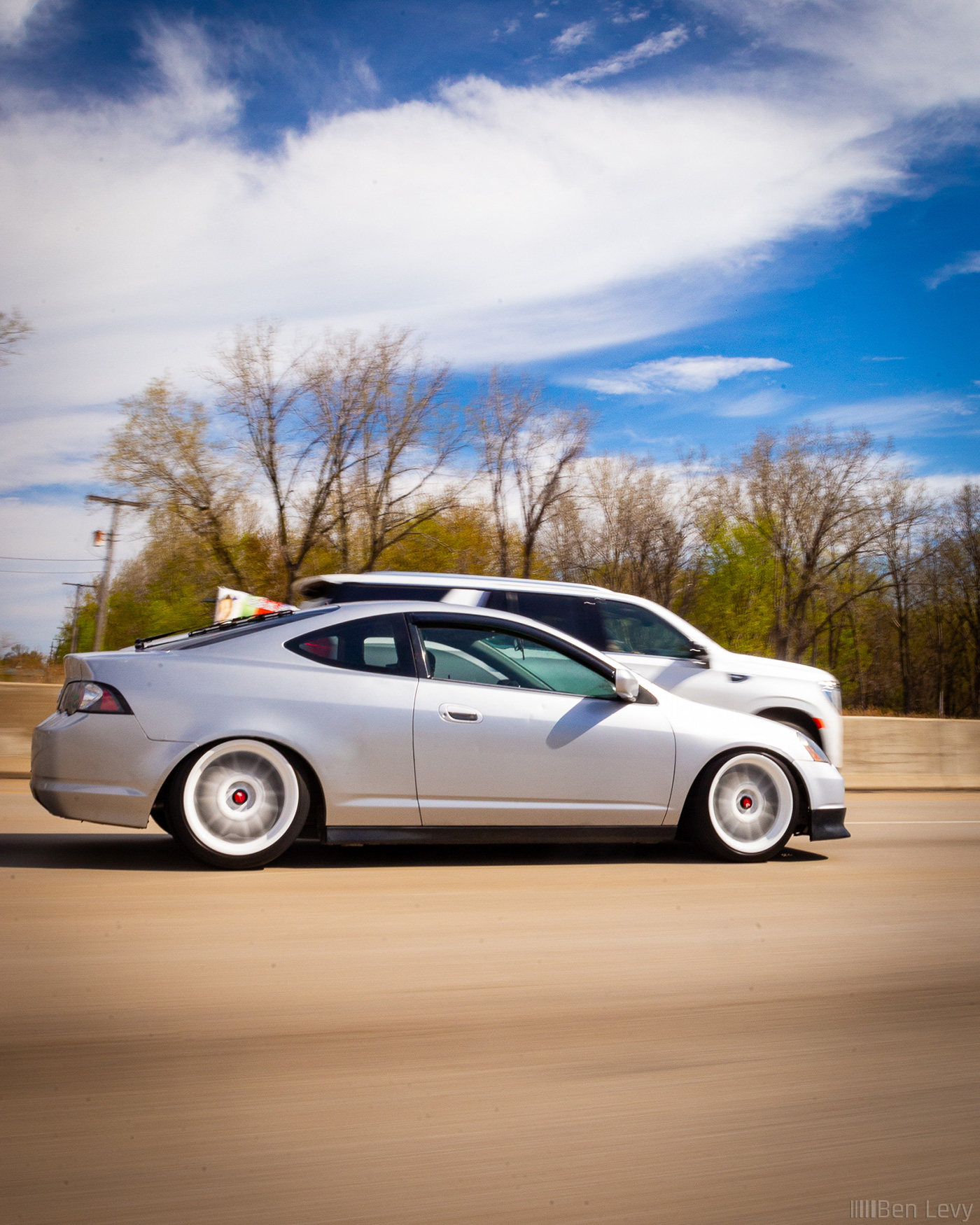 Rolling Shot of Silver Acura RSX