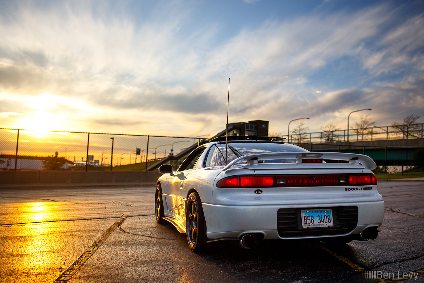 Rear of a 1G Mitsubishi 3000GT facing the Sunset