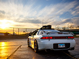 Rear of a 1G Mitsubishi 3000GT facing the Sunset