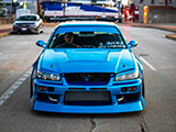 Front of Blue R34 Skyline in the Center of the Street