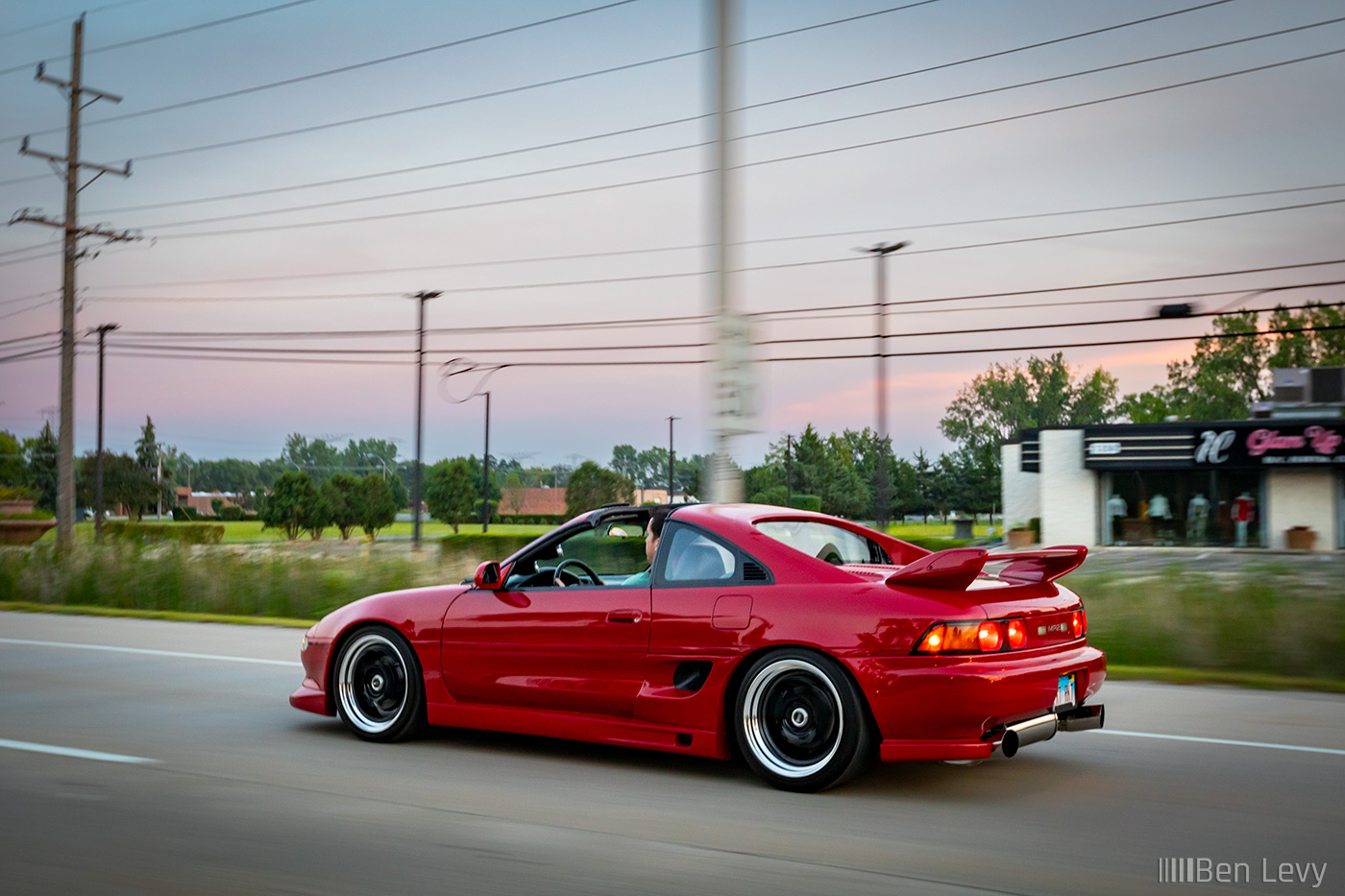 Rolling Shot of a Red Toyota MR2
