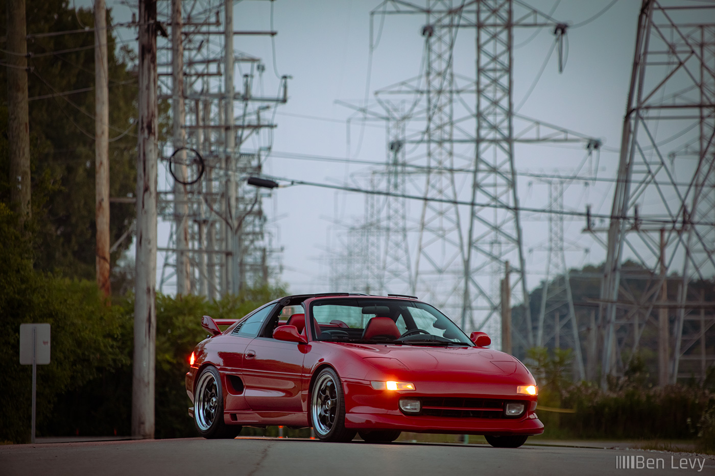 Red Toyota MR2 Turbo on a Backroad with Powerlines