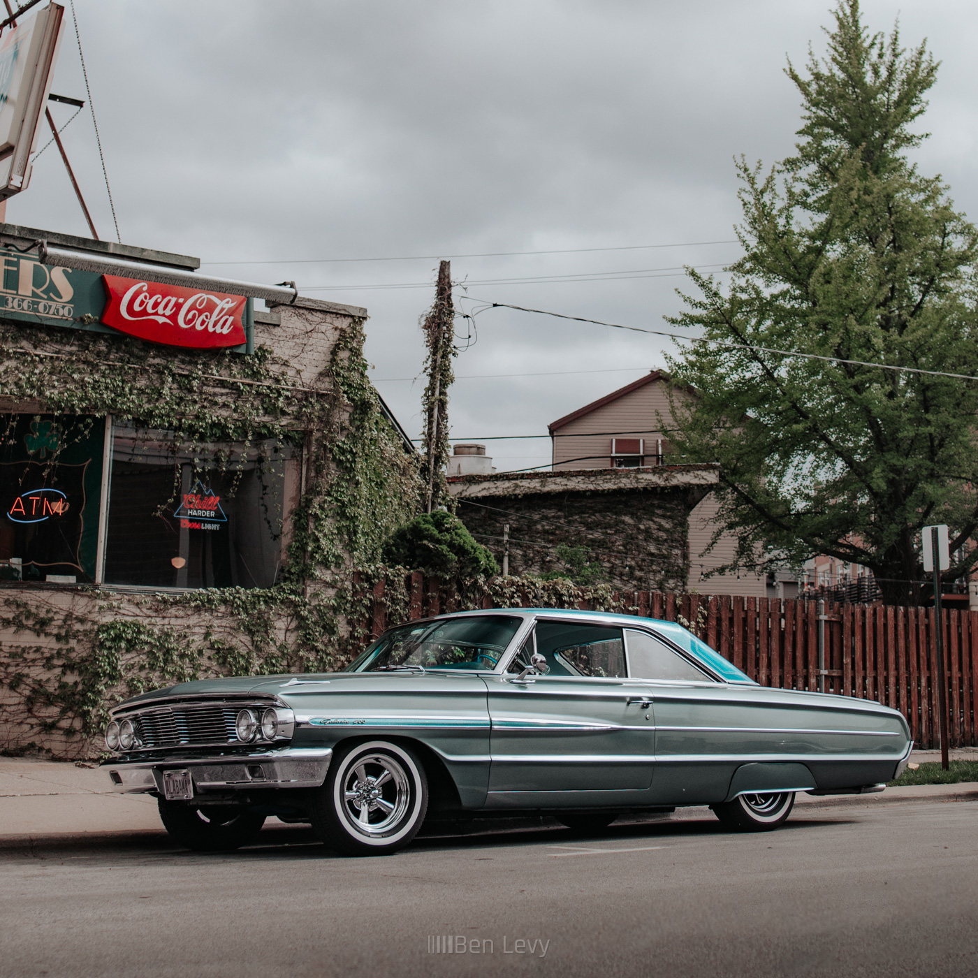 Blue Ford Galaxie 500 outside of a Bar