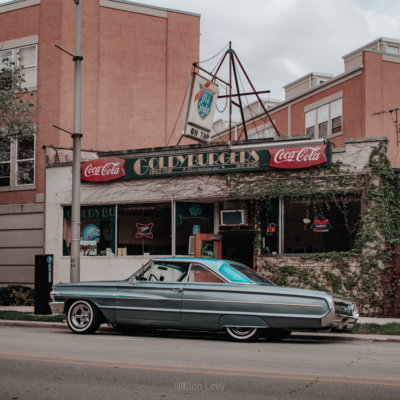 A Blue Ford Galaxie 500 outside of Goldyburgers in Forest Park