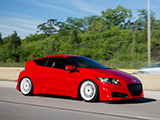 Red Honda CR-Z on the Highway