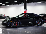 Black Porsche 911 Carrera GTS Cabriolet
