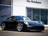 Black Porsche 911 (991) parked at The Autobarn