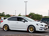 White WRX STI on Machine Gold F1R F21 wheels