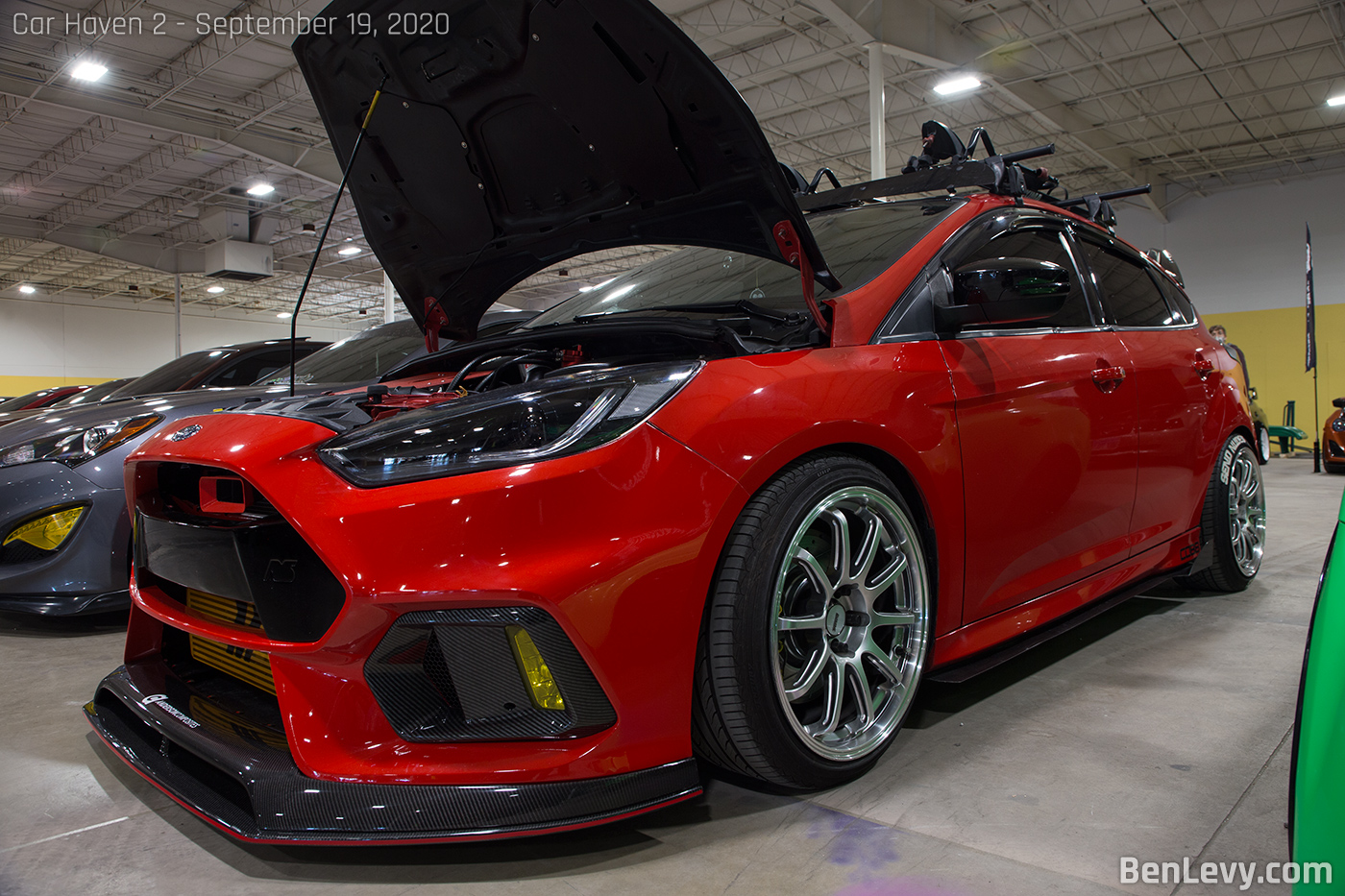 Red Ford Focus ST with Crbon Fiber Inserts in bumper