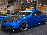 Blue Hyundai Genesis Coupe with carbon fiber hood