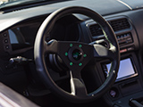 Personal Neo Grinta Steering Wheel with Black Suede and Green Stitching