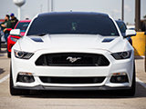Front of White S550 Mustang 5.0