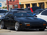 Black FC Mazda RX-7 with Uprise Car Club