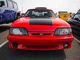 Front of Red Foxbody Mustang with Black Accents