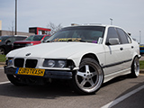 White E36 BMW Sedan on ESR Wheels