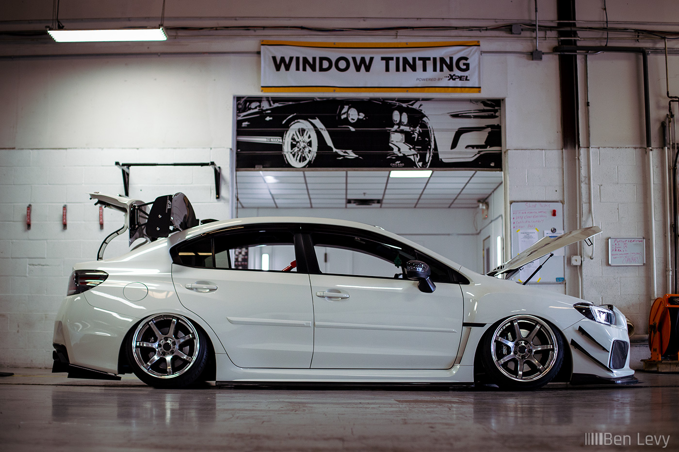 Aired-Out White WRX STI at Chicago Auto Pros