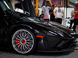 Doors up on Black Lamborghini Aventador S