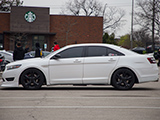 White Ford Taurus SHO with front splitter