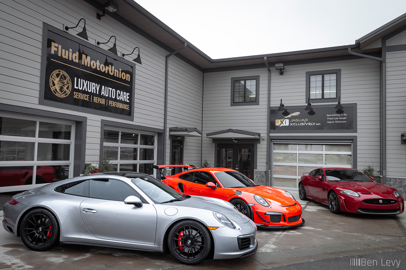 Porsche 911s and Jaguar XKR-S