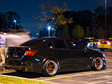 Black Subaru WRX STI sedan